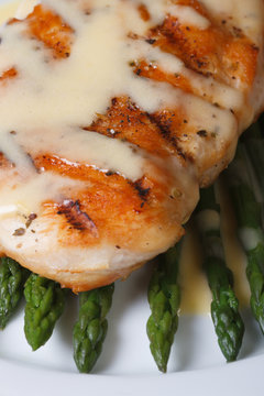 roasted meat with sauce Hollandaise and asparagus macro