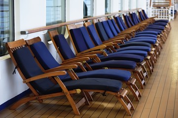 Blue Seated Sun Loungers in a Line