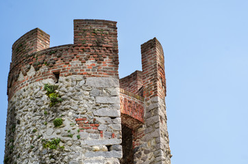 Medioeval tower made of bricks and stones