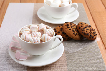 Cups of hot chocolate with marshmallows