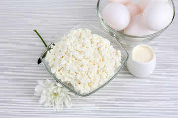 Tasty dairy products on wooden table