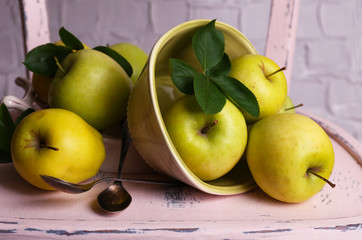 Beautiful still life with ripe sweet apples and leaves