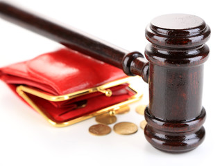 Gavel and money coins isolated on white