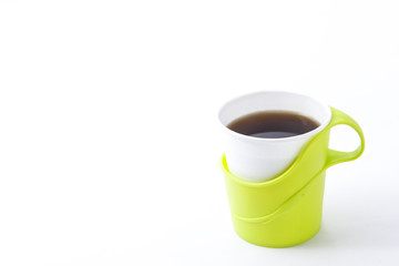 coffee poured into a paper cup
