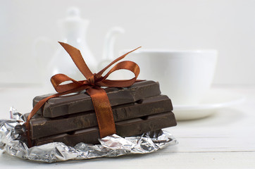 Chocolate pieces with tea set
