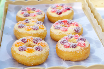 A lot of donut strawberry jam
