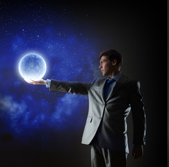 Businessman with moon