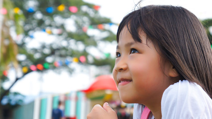 Little girl with smile gleefully