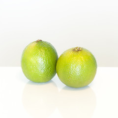Two fresh green limes