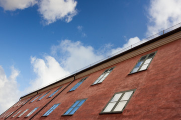 Bottom view of the red facade scandinavian house
