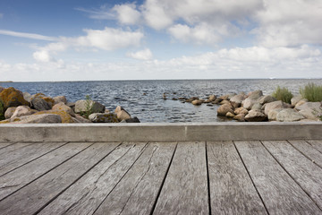 Wooden pier on the sea coast