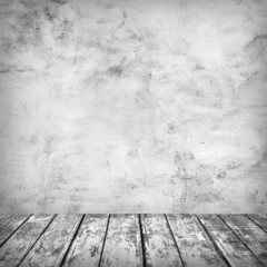 Empty room with concrete wall and wooden floor - grunge interior