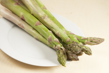 Asparagus on a white plate, macro