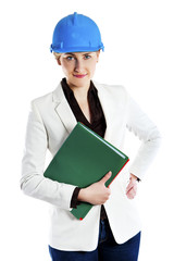 Businesswoman with construction helmet and clipboard documents.