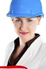 Portrait of confident young female architect standing isolated o