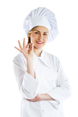 Chef woman giving a Perfect gesture with hand. Young beautiful f