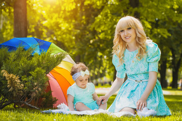 Mother with daughter in the park