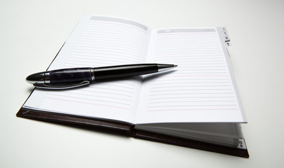 business diary with pen