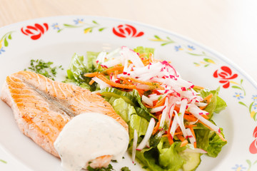 salmon steak with vegetables