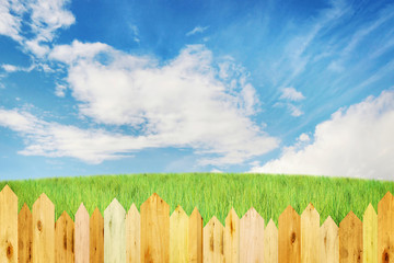 Fototapeta premium Bright summer landscape with wooden fence