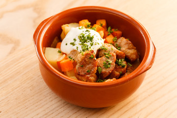meat and vegetables in the pot