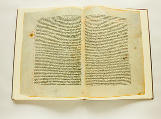 Opened vintage book with text in ancient Greek alphabeth