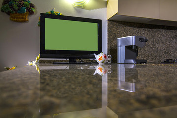 television on marble table in the kitchen