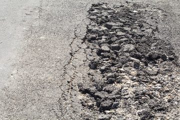 Cracked asphalt road
