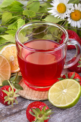 fresh and healthy homemade strawberry tea with lemon
