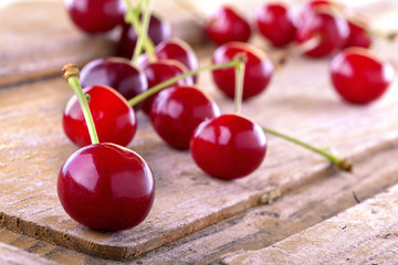 Fresh organic cherrie on the rustic table