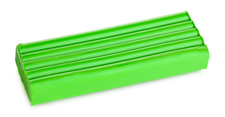 Children bright plasticine isolated on white