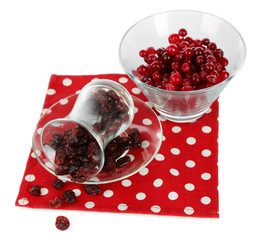 Fresh and dry cranberry in glass bowl, isolated on white
