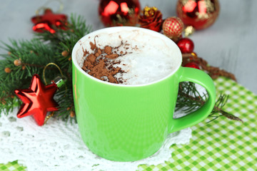 Hot chocolate with cream in color mug,