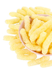 Air corn sticks in plate isolated on white