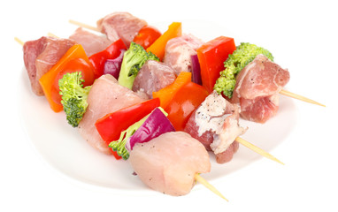 Raw pork kebab isolated on white