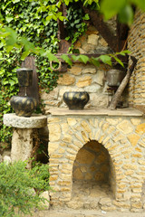 Old retro cauldrons in garden