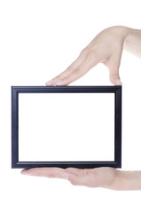 Black photo frame in hands isolated on white background