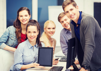 students with monitor and blank tablet pc screen
