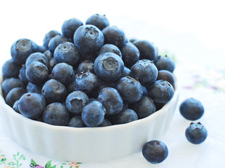 Ripe blueberries in a bowl.