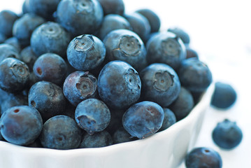 Ripe blueberries in a bowl.