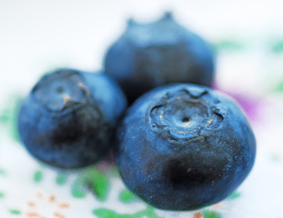 Ripe blueberries in a bowl.