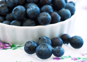 Ripe blueberries in a bowl.