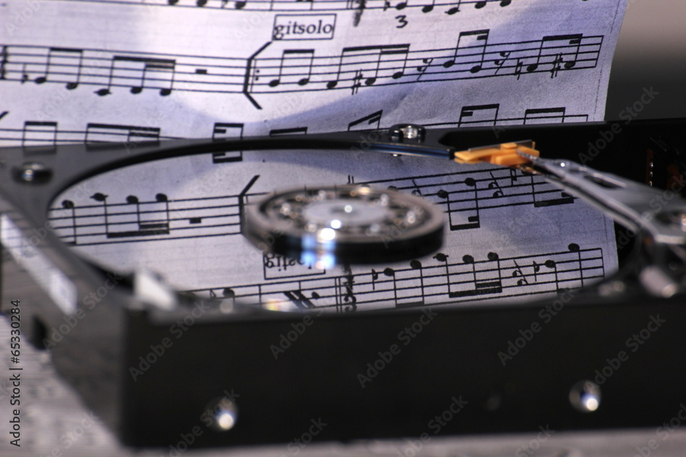 Poster hard disk with reflection of music notes