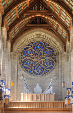 Pipe organ and cathedral ceilings.