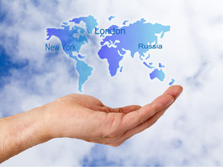 hand with world map