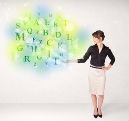 Business women with glowing letter concept