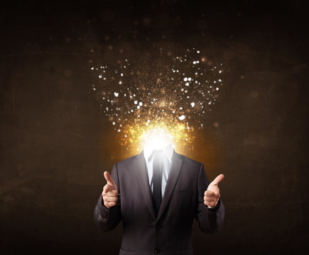 Business man with glowing exploding head