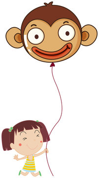 A little girl holding a monkey balloon