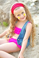 portrait of little girl on the beach