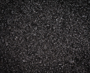 Dark asphalt surface, background.